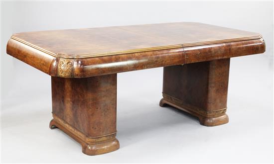 An Art Deco burr walnut extending dining table, extends 8ft 2in. x 3ft 5.5in. x 2ft 5in.